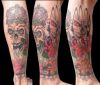 sculls tattoo on leg